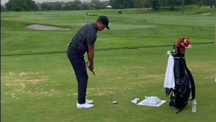 Tiger Woods hits balls in front of fans at 2022 Nexus Cup